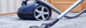 Vacuuming Carpet