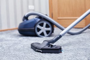 Vacuuming Carpet 