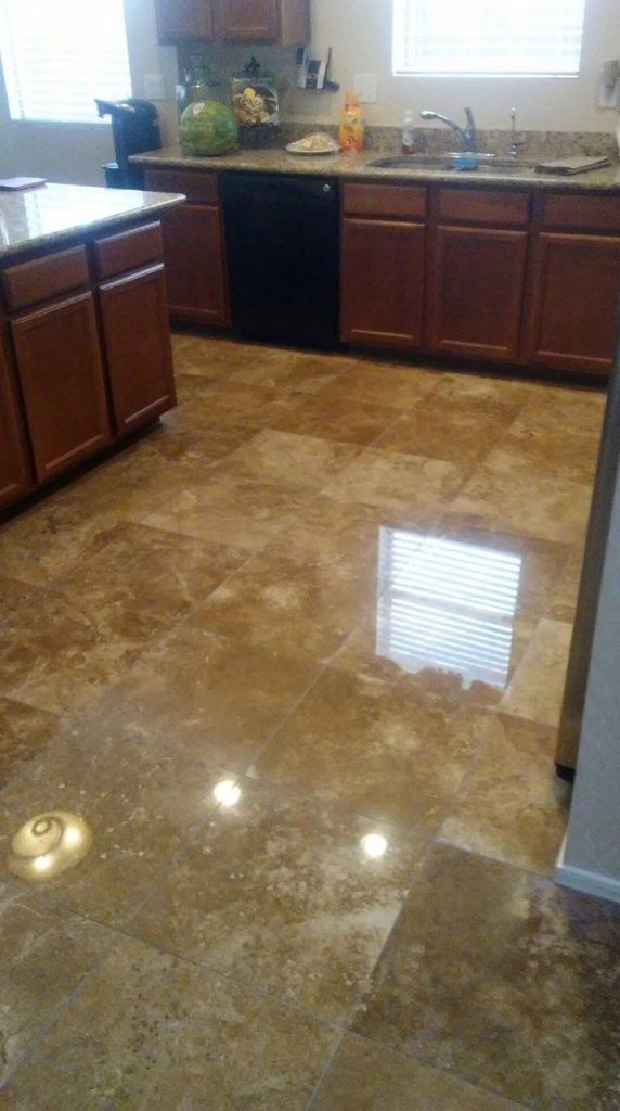 A sparkling clean stone kitchen floor